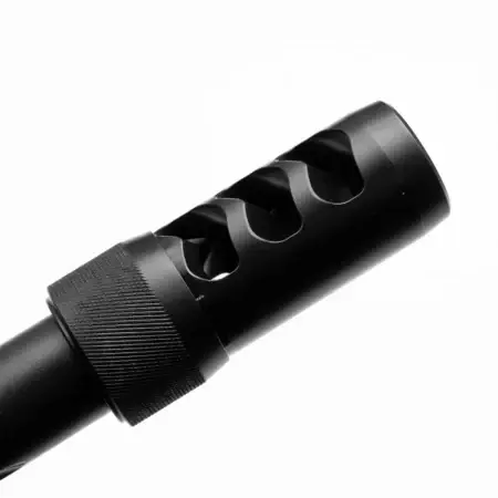 A black hellfire brake mounted to the end of a barrel