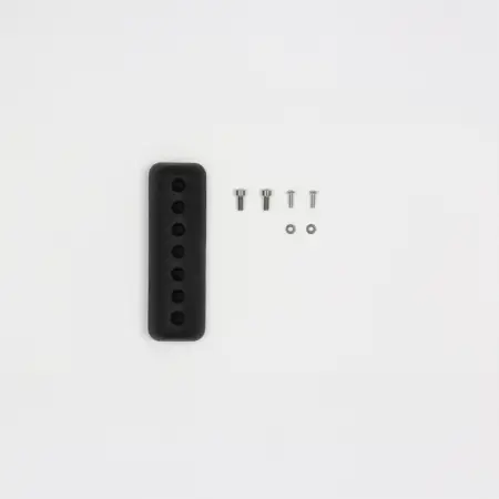 Overmolded cheekpiece with included hardware