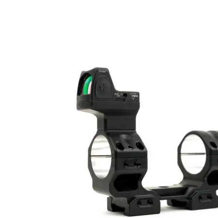 an RMR mounted on top of a one-piece tactical scope mount using a high plate.